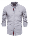 Chemise boutonnée à manches longues 100 % coton de couleur unie pour hommes