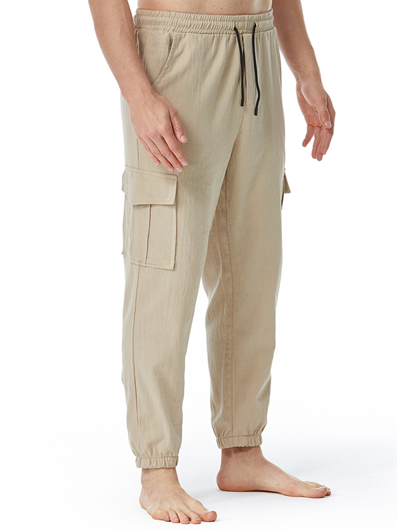 Pantalon décontracté en coton avec poches respirantes de couleur unie pour hommes