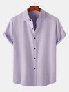 Chemise à manches courtes décontractée boutonnée en coton de couleur unie respirante pour hommes