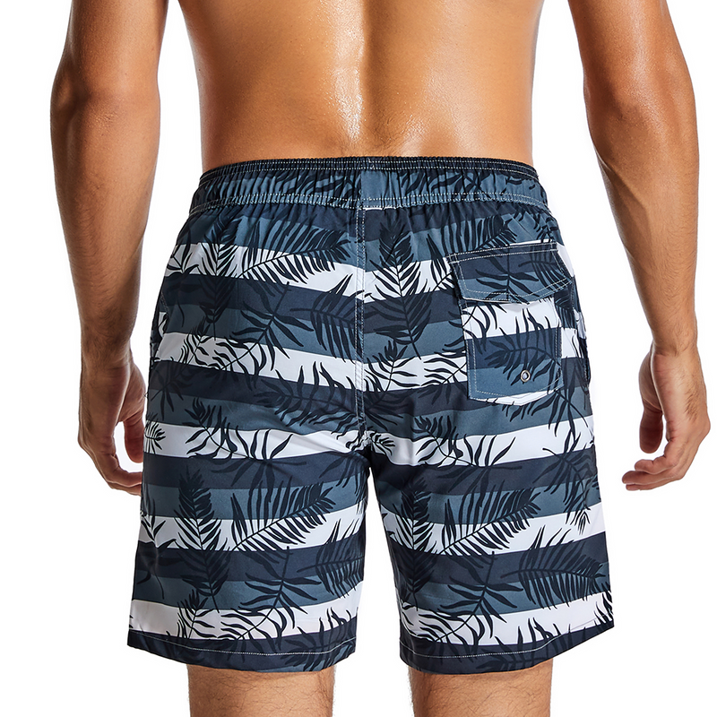 Feuilles tropicales et shorts de plage à séchage rapide rayés pour hommes