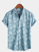 Chemise hawaïenne boutonnée à manches courtes pour homme avec imprimé palmiers en coton tropical d'été bleu plage