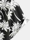 Chemise d'été à manches courtes pour homme avec motif tropical noir style hawaïen de vacances boutonnée