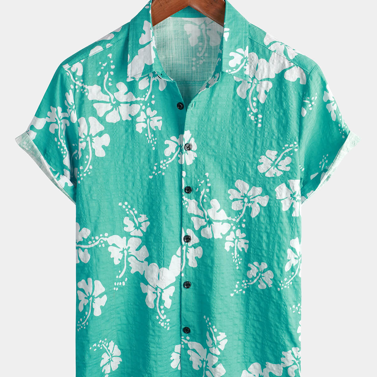 Chemise tropicale rétro à manches courtes pour homme boutonnée de couleur vert clair avec motifs floraux hawaïens idéale pour la plage estivale