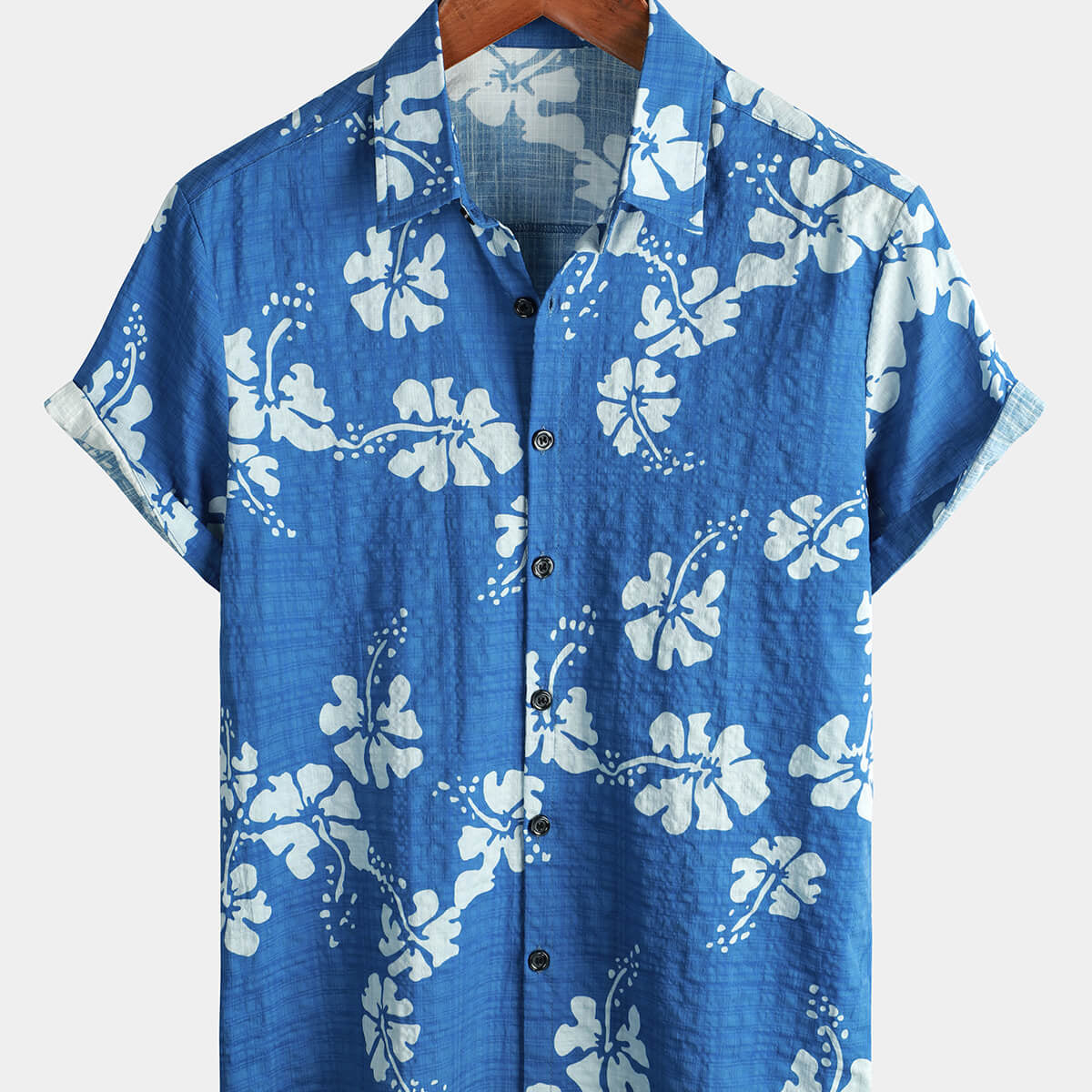 Chemise tropicale rétro à manches courtes pour homme boutonnée de couleur bleue avec motifs floraux hawaïens idéale pour la plage et les croisières