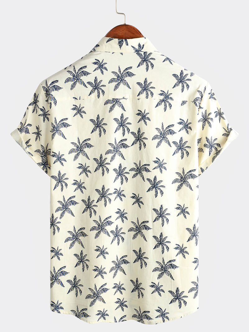 Chemise à manches courtes boutonnée en coton avec motifs d'arbres de palmiers hawaïens pour homme idéale pour les croisières et la plage