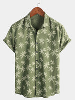 Chemise à manches courtes en coton à motifs d'arbres de palmiers pour homme boutonnée parfaite pour la plage hawaïenne et les croisières