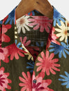 Chemise hawaïenne boutonnée pour homme, en coton floral à manches courtes de couleur vert armée parfaite pour la plage estivale.