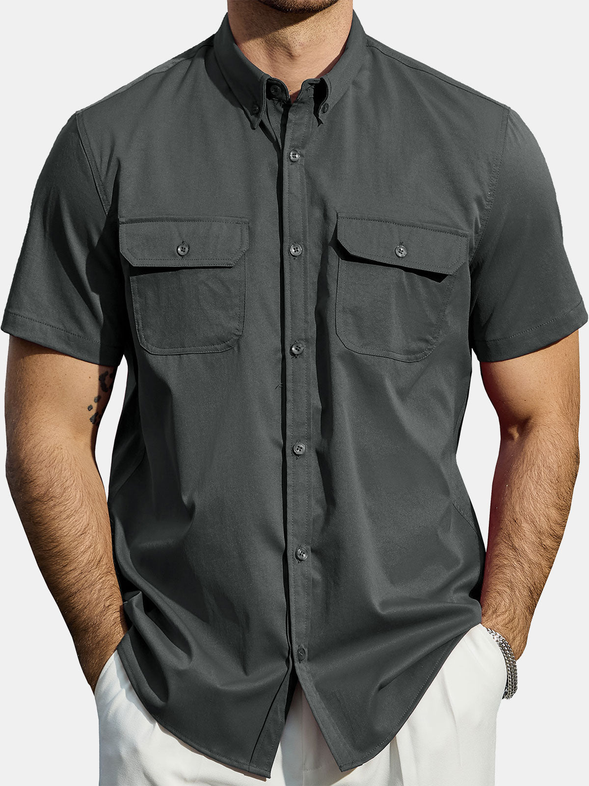 Chemise boutonnée décontractée à poches solides pour homme