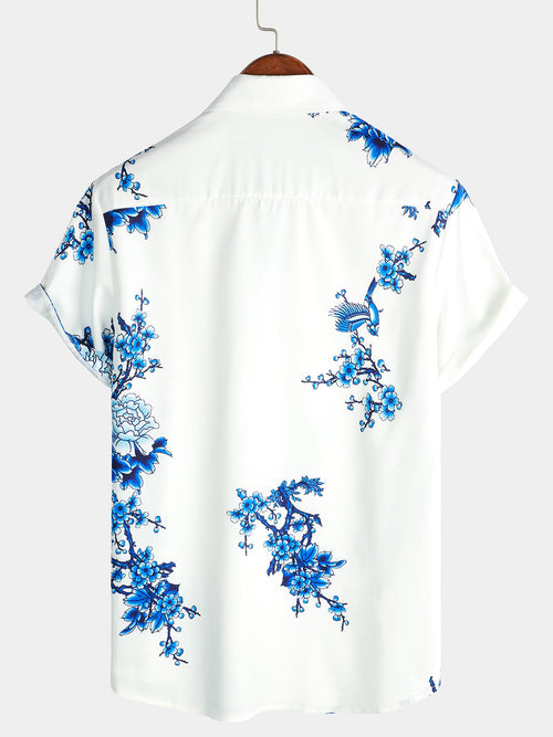 Chemise décontractée boutonnée à manches courtes pour homme bleue à imprimé floral