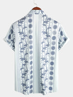 Chemise hawaïenne boutonnée bleu clair tropical à manches courtes pour homme