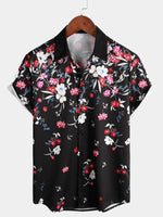 Chemise hawaïenne noire à manches courtes et boutons de vacances à fleurs roses pour hommes