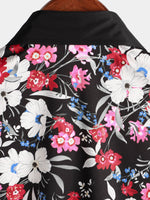 Chemise hawaïenne noire à manches courtes et boutons de vacances à fleurs roses pour hommes